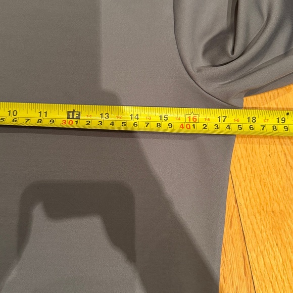 Alo Yoga Airlift Warm Hooded Runner in gray with a brushed interior for warmth. - Picture 5 of 6